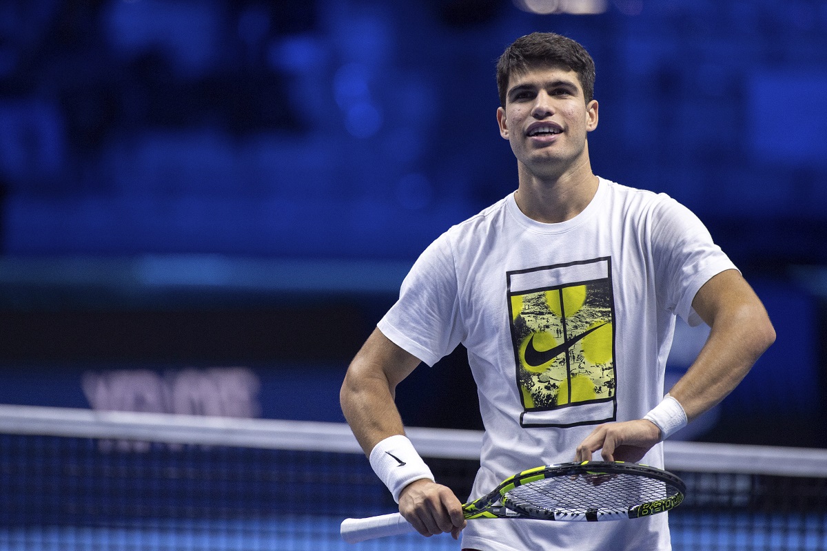 Spain's Carlos Alcaraz reacts as he plays Serbia's Novak Djokovic during a training session ahead of the ATP Finals, in Turin, Italy, Friday, Nov. 10, 2023. (Marco Alpozzi/LaPresse via AP)