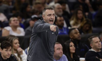 Toronto Raptors coach Darko Rajakovic yell instructions during the first half of the team's NBA basketball In-Season Tournament game against the Orlando Magic, Tuesday, Nov. 21, 2023, in Orlando, Fla. (AP Photo/Kevin Kolczynski)