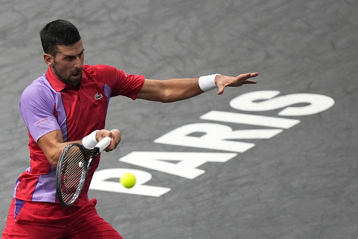 Serbia's Novak Djokovic returns the ball to Argentina's Tomas Martin Etcheverry during the second round of the Paris Masters tennis tournament, at the Accor Arena, Wednesday Nov.1, 2023 in Paris. (AP Photo/Michel Euler)