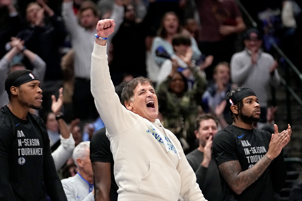 Dallas Mavericks team owner Mark Cuban celebrates late in the second half of an NBA basketball game against the Houston Rockets in Dallas, Tuesday, Nov. 28, 2023. (AP Photo/Tony Gutierrez)