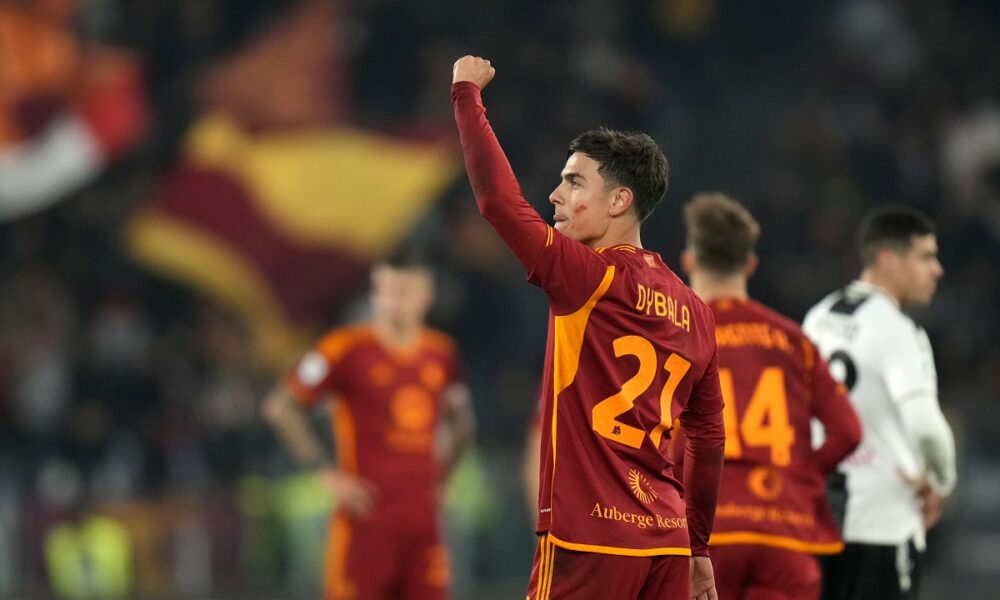 Roma's Paulo Dybala celebrates after scoring his sides second goal during the Italian Serie A soccer match between Roma and Udinese at Rome's Olympic Stadium, Italy, Sunday, Nov. 26, 2023. (AP Photo/Alessandra Tarantino)