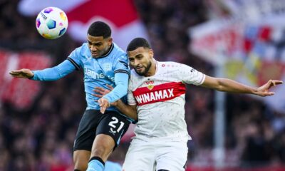 Leverkusen's Amine Adli, left, in action against Stuttgart's Josha Vagnoman during the Bundesliga soccer match between Bayer Leverkusen and VfB Stuttgart at MHP Arena stadium in Stuttgart, Germany, Sunday Dec. 10, 2023. (Tom Weller/dpa via AP)