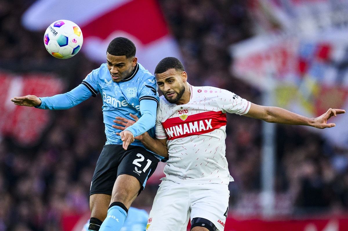 Leverkusen's Amine Adli, left, in action against Stuttgart's Josha Vagnoman during the Bundesliga soccer match between Bayer Leverkusen and VfB Stuttgart at MHP Arena stadium in Stuttgart, Germany, Sunday Dec. 10, 2023. (Tom Weller/dpa via AP)