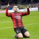 AC Milan's Luka Jovic celebrates after scoring the opening goal during the Serie A soccer match between AC Milan and Frosinone at the San Siro stadium, in Milan, Italy, Friday, Dec. 2, 2023. (AP Photo/Luca Bruno)