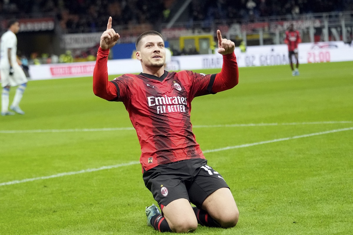 AC Milan's Luka Jovic celebrates after scoring the opening goal during the Serie A soccer match between AC Milan and Frosinone at the San Siro stadium, in Milan, Italy, Friday, Dec. 2, 2023. (AP Photo/Luca Bruno)