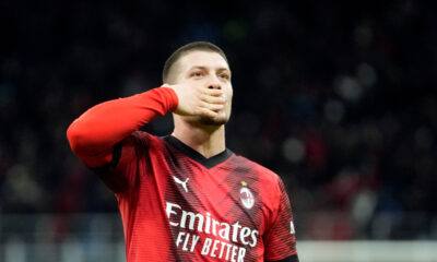 AC Milan's Luka Jovic celebrates after scoring the opening goal during the Serie A soccer match between AC Milan and Frosinone at the San Siro stadium, in Milan, Italy, Friday, Dec. 2, 2023. (AP Photo/Luca Bruno)