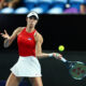 Olga Danilovic of Serbia plays a return shot to Qinwen Zheng of China during the United Cup tennis tournament in Perth, Australia, Sunday, Dec. 31, 2023. (AP Photo/Trevor Collens)