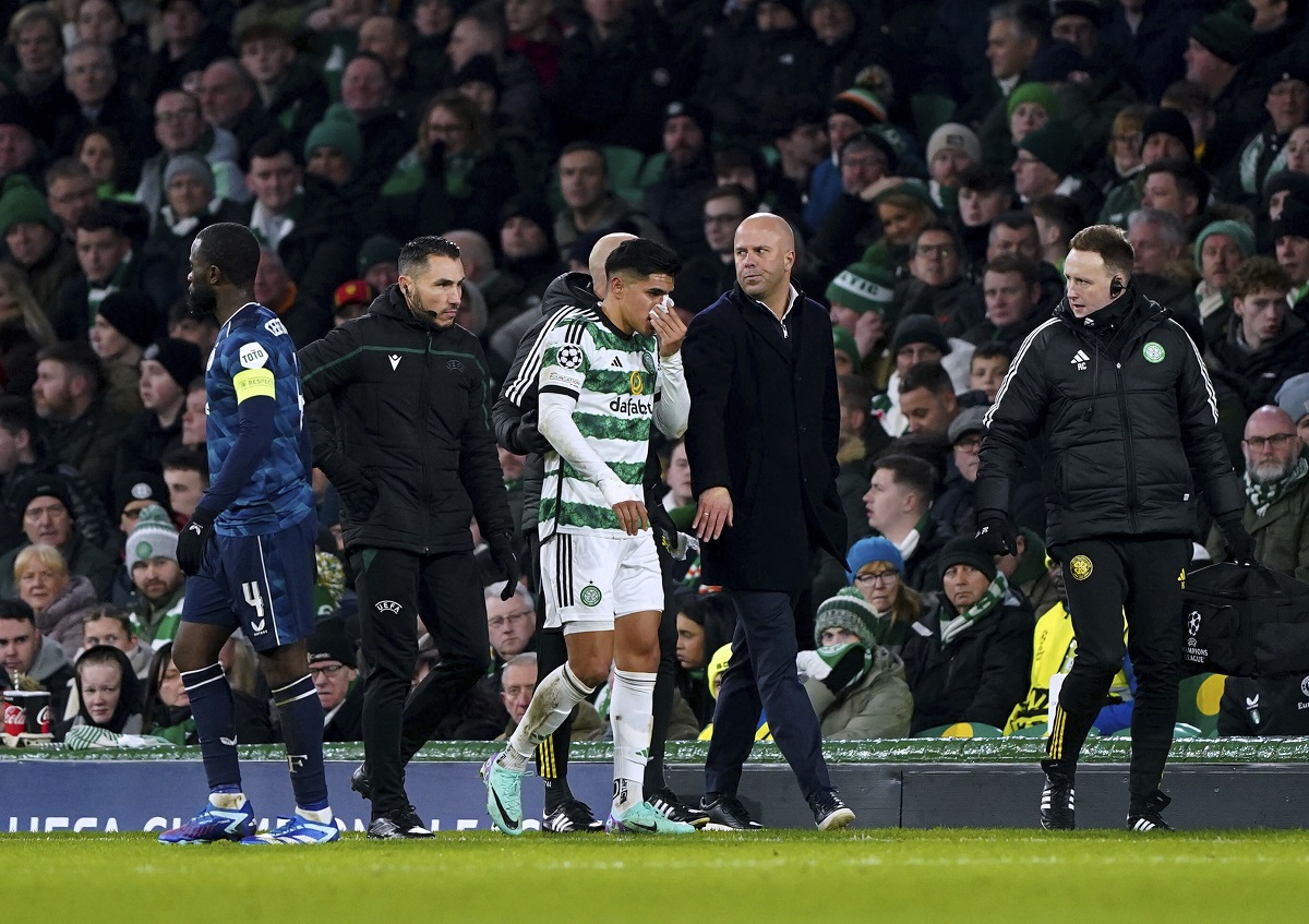 Celtic's Luis Palma goes off injured during the Champions League, Group E, soccer match between Celtic and Feyenoord at Celtic Park, Glasgow, Scotland, Wednesday, Dec. 13, 2023. (Andrew Milligan/PA via AP)