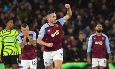 Aston Villa's John McGinn celebrates after scoring his side's opening goal during the English Premier League soccer match between Aston Villa and Arsenal at Villa Park in Birmingham, England, Saturday, Dec. 9, 2023. (AP Photo/Rui Vieira)