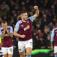Aston Villa's John McGinn celebrates after scoring his side's opening goal during the English Premier League soccer match between Aston Villa and Arsenal at Villa Park in Birmingham, England, Saturday, Dec. 9, 2023. (AP Photo/Rui Vieira)