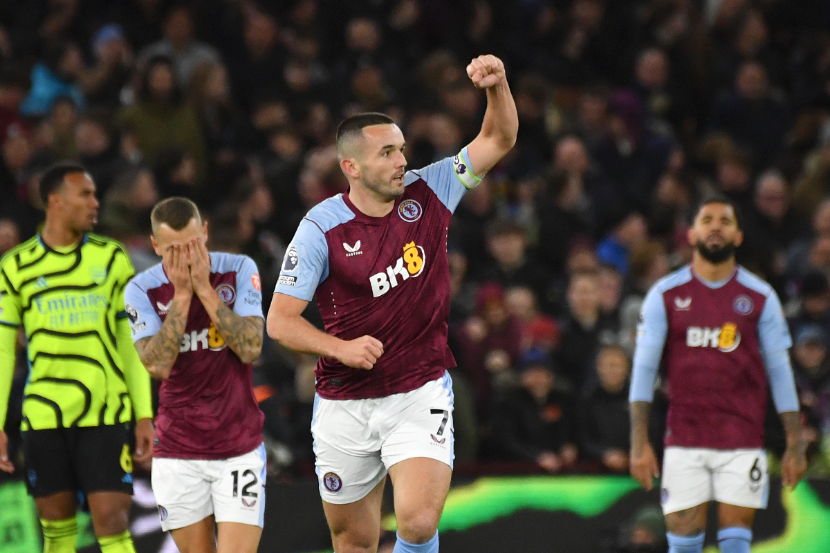 Aston Villa's John McGinn celebrates after scoring his side's opening goal during the English Premier League soccer match between Aston Villa and Arsenal at Villa Park in Birmingham, England, Saturday, Dec. 9, 2023. (AP Photo/Rui Vieira)