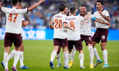 Manchester City's Mateo Kovacic celebrates with teammate Kyle Walker, 2nd right, after scoring his side's second goal during the Soccer Club World Cup semifinal soccer match between Urawa Reds and Manchester City FC at King Abdullah Sports City Stadium in Jeddah, Saudi Arabia, Tuesday, Dec. 19, 2023. (AP Photo/Manu Fernandez)