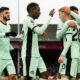 Chelsea's Cole Palmer, right, celebrates with teammates after scoring his sides first goal during the English Premier League soccer match between Luton Town and Chelsea, at Kenilworth Road, in Luton, England, Saturday, Dec. 30, 2023. (AP Photo/Alastair Grant)