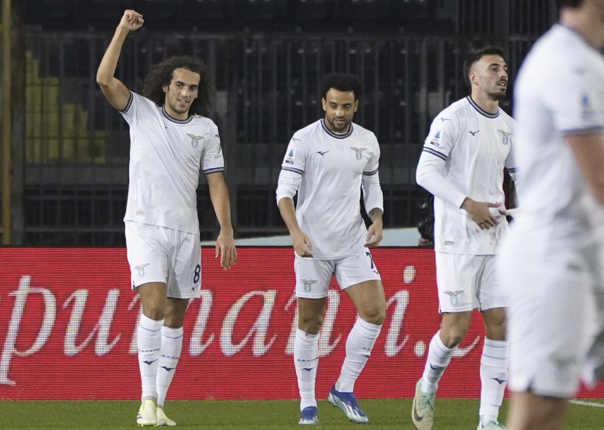 Lazio's Matteo Guendouzi, left, celebrates after scoring their side's first goal of the game during the Serie A soccer match between Empoli FC and Lazio Rome at the Castellani Empoli stadium in Empoli, Italy, Friday Dec. 22, 2023. (Marco Bucco/LaPresse via AP)