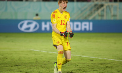 Germany's goalkeeper Konstantin Heide celebrates after making a safe during a penalty shootout against Argentina during their U-17 World Cup semifinal soccer match at Manahan Stadium in Surakarta, Central Java, Indonesia, Tuesday, Nov. 28, 2023. (AP Photo/John Sumbar)