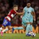 FILE - Granada's Bryan Zaragoza pushes Barcelona's Ilkay Gundogan during a Spanish La Liga soccer match between Granada and Barcelona at Los Carmanes Stadium in Granada, Spain, on Oct. 8, 2023. Bayern Munich is signing Spain winger Bryan Zaragoza from struggling La Liga team Granada, with the deal set to go through in July. The German champion said Wednesday Dec. 6, 2023 that the 22-year-old Zaragoza would sign a five-year contract running through to 2029 when he joins Bayern at the end of the season. (AP Photo/Fermin Rodriguez, File)