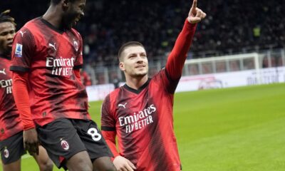 AC Milan's Luka Jovic, right, celebrates after scoring the opening goal during the Serie A soccer match between AC Milan and Frosinone at the San Siro stadium, in Milan, Italy, Friday, Dec. 2, 2023. (AP Photo/Luca Bruno)