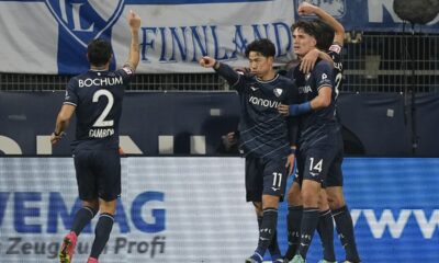 Bochum's Takuma Asano, center, celebrates after he scored the opening goal during the German Bundesliga soccer match between VfL Bochum and Union Berlin in Bochum, Germany, Saturday, Dec. 16, 2023. (AP Photo/Martin Meissner)