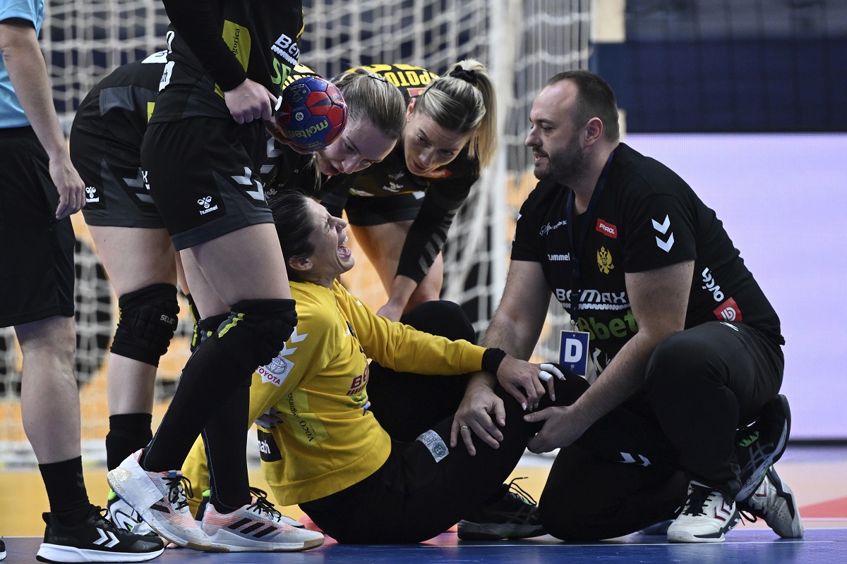 Montenegro goalkeeper Marta Batinovic is injured during the IHF Women's World Championship handball match between Montenegro and Croatia at Scandinavium Arena in Gothenburg, Sweden, Thursday Dec. 7, 2023. (Bjorn Larsson/TT News Agency via AP)