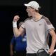 Janik Siner of Italy reacts after winning the second set against Andrey Rublev of Russia during their quarterfinal match at the Australian Open tennis championships at Melbourne Park, Melbourne, Australia, Wednesday, Jan. 24, 2024. (AP Photo/Alessandra Tarantino)