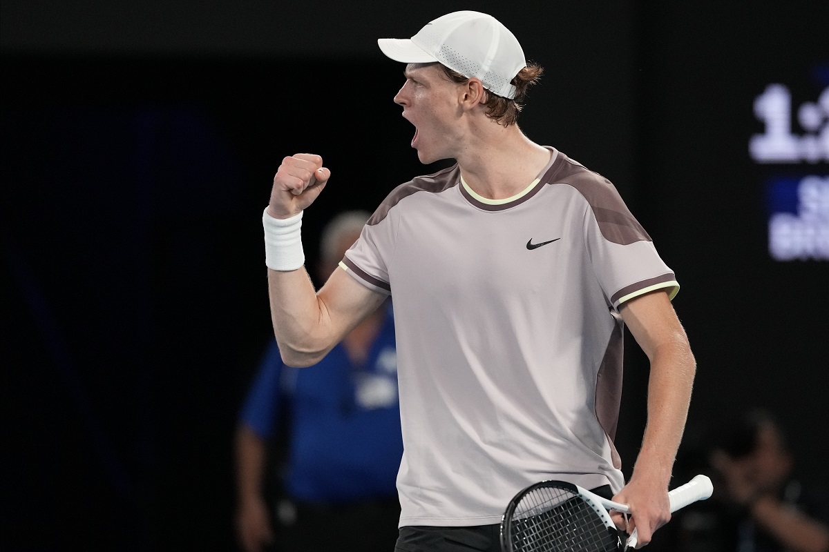 Janik Siner of Italy reacts after winning the second set against Andrey Rublev of Russia during their quarterfinal match at the Australian Open tennis championships at Melbourne Park, Melbourne, Australia, Wednesday, Jan. 24, 2024. (AP Photo/Alessandra Tarantino)