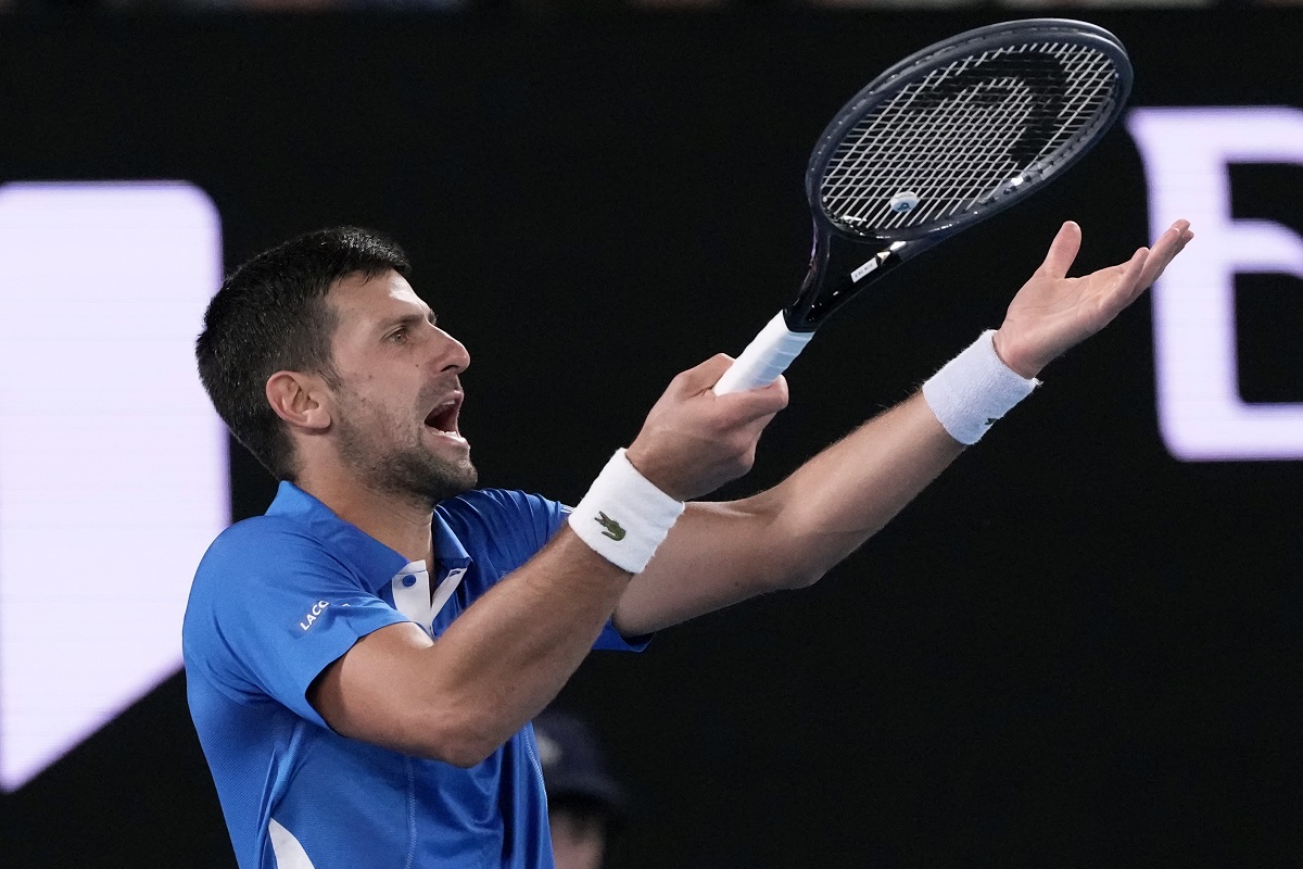 Serbia's Novak Djokovic reacts during his first round match against Croatia's Dino Prizmic at the Australian Open tennis championships at Melbourne Park, Melbourne, Australia, Sunday, Jan. 14, 2024. (AP Photo/Andy Wong)