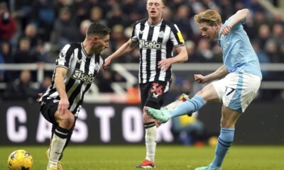 Manchester City's Kevin De Bruyne scores his side's second goal of the game, during the English Premier League soccer match between Newcastle United and Manchester City, at St. James' Park, in Newcastle upon Tyne, England, Saturday, Jan. 13, 2024. (Owen Humphreys/PA via AP)