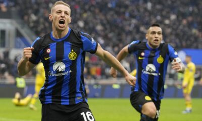 Inter Milan's Davide Frattesi, left, celebrates with Lautaro Martinez after scoring his side's second goal during the Serie A soccer match between Inter Milan and Hellas Verona at the San Siro Stadium in Milan, Italy, Saturday, Jan. 6, 2024. (AP Photo/Antonio Calanni)