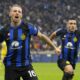 Inter Milan's Davide Frattesi, left, celebrates with Lautaro Martinez after scoring his side's second goal during the Serie A soccer match between Inter Milan and Hellas Verona at the San Siro Stadium in Milan, Italy, Saturday, Jan. 6, 2024. (AP Photo/Antonio Calanni)