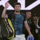Miomir Kecmanovic of Serbia waves as he leaves Rod Laver Arena following his fourth round loss to Carlos Alcaraz of Spain during their fourth round match at the Australian Open tennis championships at Melbourne Park, Melbourne, Australia, Monday, Jan. 22, 2024. (AP Photo/Andy Wong)