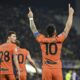 Inter's Lautaro Martinez celebrates scoring during the Italian Serie A soccer match between Fiorentina and Inter at the Artemio Franchi Stadium, in Florence, Italy, Sunday, Jan. 28, 2024. (Massimo Paolone/LaPresse via AP)
