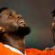 Ivory Coast's Jean-Philippe Krasso, left, celebrates with teammate after scoring his team second goal during the African Cup of Nations Group A soccer match between Ivory Coast and Guinea-Bissau in Abidjan, Ivory Coast, Saturday, Jan. 13, 2024. (AP Photo/Sunday Alamba)