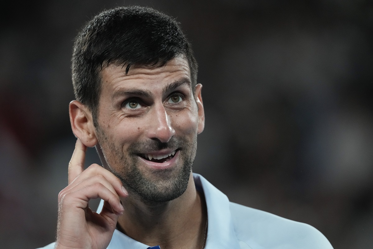 Serbia's Novak Djokovic reacts during his first round match against Croatia's Dino Prizmic at the Australian Open tennis championships at Melbourne Park, Melbourne, Australia, Sunday, Jan. 14, 2024. (AP Photo/Alessandra Tarantino)