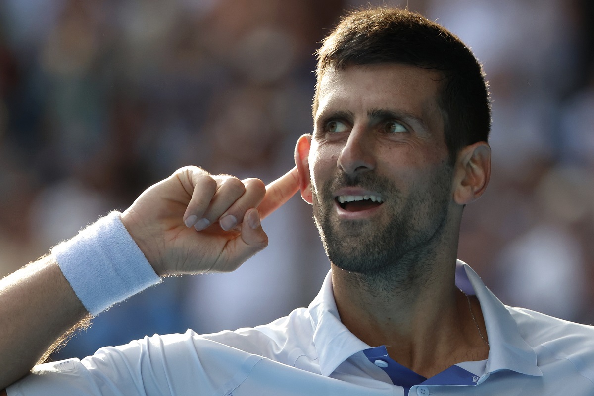 Novak Djokovic of Serbia reacts during his quarterfinal against Taylor Fritz of the U.S. at the Australian Open tennis championships at Melbourne Park, Melbourne, Australia, Tuesday, Jan. 23, 2024. (AP Photo/Asanka Brendon Ratnayake)