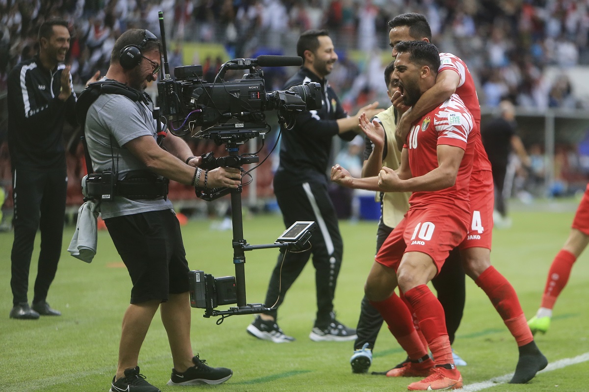 Jordan's Mousa Altamari celebrates after scoring his side's second goal during the Asian Cup round of 16 soccer match between Iraq and Jordan at Khalifa International Stadium in Doha, Qatar, Monday, Jan. 29, 2024. (AP Photo/Hussein Sayed)