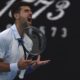 Novak Djokovic of Serbia reacts after losing a point to Taylor Fritz of the U.S. during their quarterfinal match at the Australian Open tennis championships at Melbourne Park, Melbourne, Australia, Tuesday, Jan. 23, 2024. (AP Photo/Asanka Brendon Ratnayake)