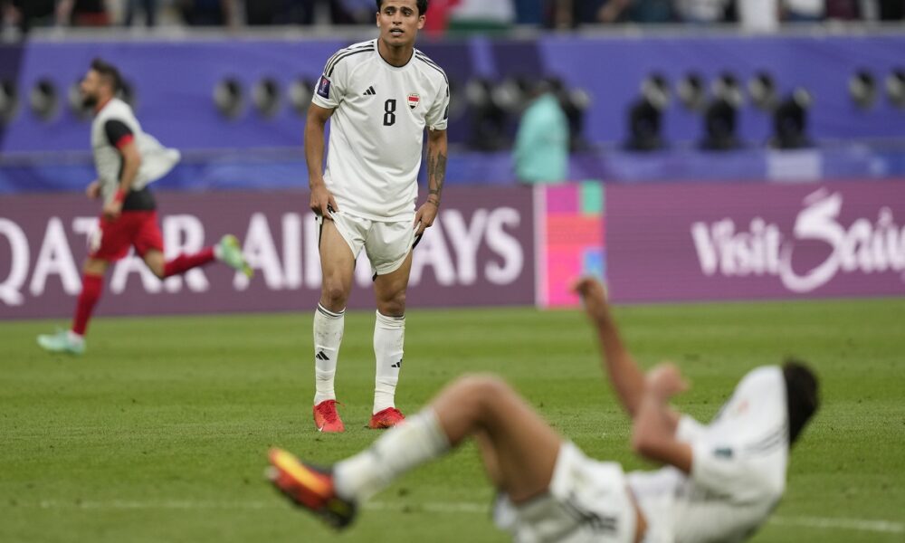 Iraq's Ibrahim Bayesh Al-Kaabawi is dejected at full time of the Asian Cup Round of 16 soccer match between Iraq and Jordan, at Khalifa International Stadium in Doha, Qatar, Monday, Jan. 29, 2024. Jordan won 3-2. (AP Photo/Thanassis Stavrakis)