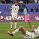 Iraq's Ibrahim Bayesh Al-Kaabawi is dejected at full time of the Asian Cup Round of 16 soccer match between Iraq and Jordan, at Khalifa International Stadium in Doha, Qatar, Monday, Jan. 29, 2024. Jordan won 3-2. (AP Photo/Thanassis Stavrakis)