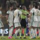 Algeria players protest to the referee Issa Sy during the African Cup of Nations Group D soccer match between Algeria and Angola in Bouake, Ivory Coast, Monday, Jan. 15, 2024. (AP Photo/Themba Hadebe)