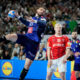 France's Ludovic Fabregas, left, throws the ball against Denmark's Magnus Saugstrup during the Handball European Championship final match between France and Denmark in Cologne, Germany, Sunday, Jan. 28, 2024. (AP Photo/Martin Meissner)