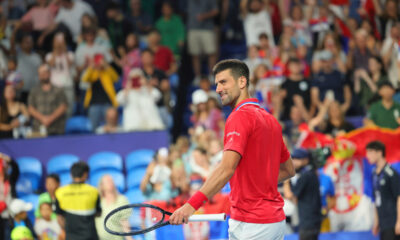 Novak Djokovic of Serbia celebrates his win over Zhizhen Zhang of China during the United Cup tennis tournament in Perth, Australia, Sunday, Dec. 31, 2023. (AP Photo/Trevor Collens)