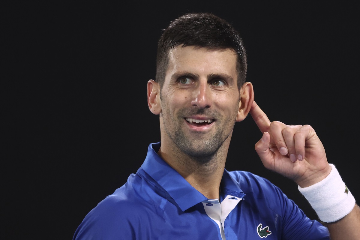 Novak Djokovic of Serbia gestures to the crowd during his third round match against Tomas Martin Etcheverry of Argentina at the Australian Open tennis championships at Melbourne Park, Melbourne, Australia, Friday, Jan. 19, 2024. (AP Photo/Asanka Brendon Ratnayake)