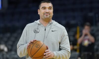 FILE - Golden State Warriors assistant coach Dejan Milojevic smiles during an NBA preseason basketball game against the Denver Nuggets San Francisco, Friday, Oct. 14, 2022. Warriors assistant coach Dejan Milojević, a mentor to two-time NBA MVP Nikola Jokic and a former star player in his native Serbia, died Wednesday, Jan. 17, 2024, after suffering a heart attack, the team announced. Milojević, part of the staff that helped the Warriors win the 2022 NBA championship, was 46.(AP Photo/Jeff Chiu, File)