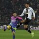 AC Milan's Christian Pulisic, left, and Uninese's Lazar Samardzic charge the ball during the Serie A soccer match between Udinese and Milan in Udine, Italy, Saturday, Jan. 20, 2024. (Andrea Bressanutti/LaPresse via AP)