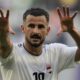 Iraq's Aymen Hussein celebrates after scoring his side's second goal during the Asian Cup Group C soccer match between Iraq and Japan at the Education City Stadium in Al Rayyan, Qatar, Friday, Jan. 19, 2024. (AP Photo/Aijaz Rahi)