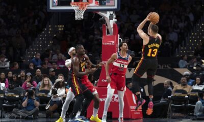 Atlanta Hawks' Bogdan Bogdanovic (13) shoots to the basket against the Washington Wizards during the first half of an NBA basketball game Sunday, Dec. 31, 2023, in Washington. (AP Photo/Jose Luis Magana)