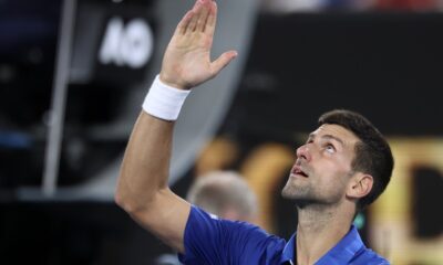 Novak Djokovic of Serbia celebrates after defeating Tomas Martin Etcheverry of Argentina in their third round match at the Australian Open tennis championships at Melbourne Park, Melbourne, Australia, Friday, Jan. 19, 2024. (AP Photo/Asanka Brendon Ratnayake)