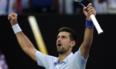 Novak Djokovic of Serbia celebrates after defeating Taylor Fritz of the U.S. in their quarterfinal match at the Australian Open tennis championships at Melbourne Park, Melbourne, Australia, Tuesday, Jan. 23, 2024. (AP Photo/Asanka Brendon Ratnayake)