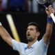 Novak Djokovic of Serbia celebrates after defeating Taylor Fritz of the U.S. in their quarterfinal match at the Australian Open tennis championships at Melbourne Park, Melbourne, Australia, Tuesday, Jan. 23, 2024. (AP Photo/Asanka Brendon Ratnayake)