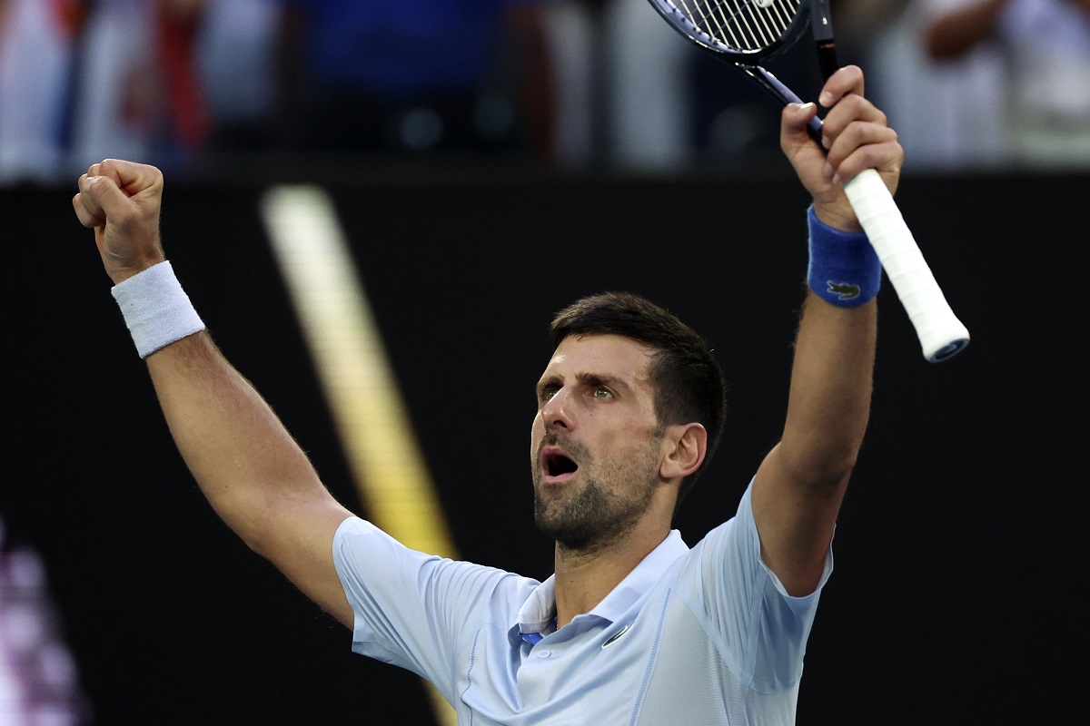 Novak Djokovic of Serbia celebrates after defeating Taylor Fritz of the U.S. in their quarterfinal match at the Australian Open tennis championships at Melbourne Park, Melbourne, Australia, Tuesday, Jan. 23, 2024. (AP Photo/Asanka Brendon Ratnayake)
